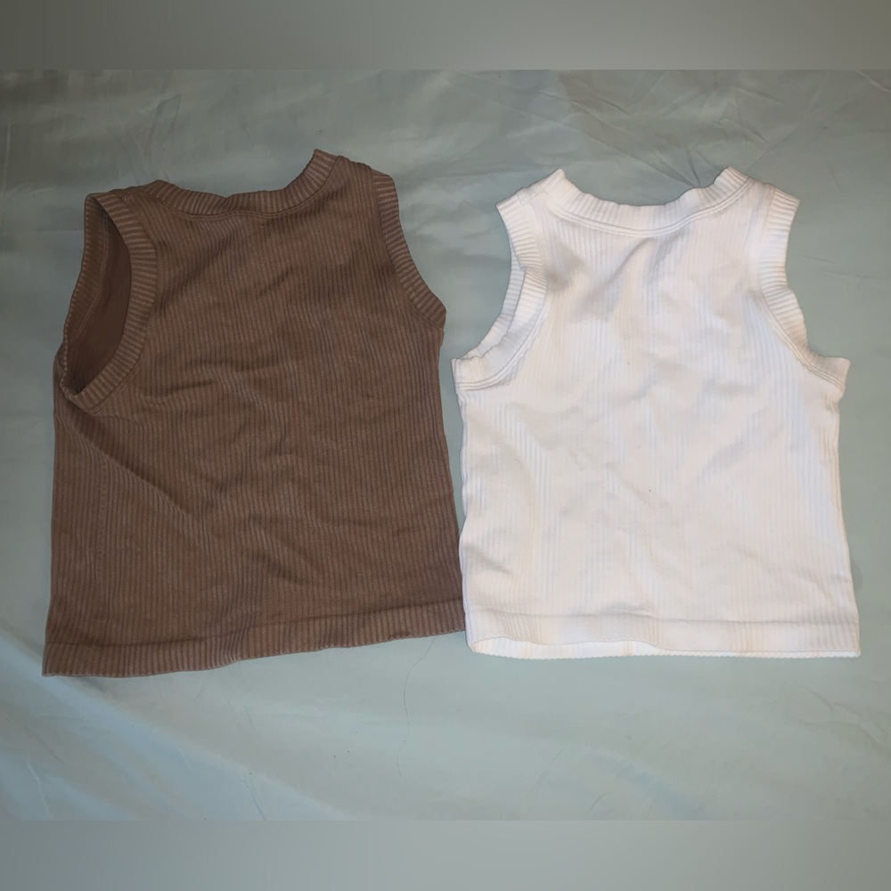 White and tan sleeveless tops